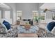 Open living area with hardwood floors and plenty of natural light at 226 Comiskey Park Cir, Summerville, SC 29485