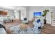 Spacious living room with hardwood floors and comfy seating at 226 Comiskey Park Cir, Summerville, SC 29485