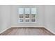 Bright office space with three large windows and hardwood floor at 226 Comiskey Park Cir, Summerville, SC 29485