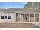 Spacious screened porch with view of backyard at 226 Comiskey Park Cir, Summerville, SC 29485