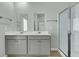 Bathroom featuring a double vanity and enclosed glass shower with modern fixtures at 229 Grand View Xing, Summerville, SC 29483