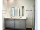 Bright bathroom features a double vanity, modern finishes and a glass-enclosed shower at 229 Grand View Xing, Summerville, SC 29483
