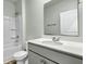 Bathroom features include a sink, toilet, shower, and grey cabinet at 229 Grand View Xing, Summerville, SC 29483