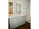 Bright bathroom features a double vanity, modern finishes and a glass-enclosed shower at 229 Grand View Xing, Summerville, SC 29483