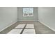Bright bedroom featuring neutral walls, carpet, and a window for natural light at 229 Grand View Xing, Summerville, SC 29483
