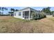 Home with vinyl siding, screened in porch and large windows at 229 Grand View Xing, Summerville, SC 29483