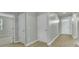 Hallway with a combination of carpet and wood-look flooring at 229 Grand View Xing, Summerville, SC 29483