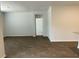 Spacious living room with dark brown wood-look flooring at 229 Grand View Xing, Summerville, SC 29483