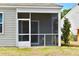 Enjoy outdoor living in this screened porch that is perfect for relaxation at 229 Grand View Xing, Summerville, SC 29483