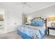 Bright bedroom with a comfortable bed and built-in closet at 26 Cormorant Island Ln, Kiawah Island, SC 29455