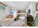 ' bedroom with twin-size bunk bed and sitting area at 26 Cormorant Island Ln, Kiawah Island, SC 29455
