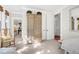 Bedroom with a wooden armoire and access to another room at 26 Cormorant Island Ln, Kiawah Island, SC 29455