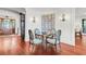 Cozy breakfast nook with a small table and four chairs, adjacent to kitchen at 26 Cormorant Island Ln, Kiawah Island, SC 29455