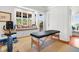 Exercise room with massage table and window seat at 26 Cormorant Island Ln, Kiawah Island, SC 29455