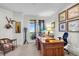 Home office with large desk, French doors, and water views at 26 Cormorant Island Ln, Kiawah Island, SC 29455