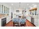 Open concept kitchen with double oven and hardwood floors at 26 Cormorant Island Ln, Kiawah Island, SC 29455