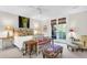 Spacious main bedroom with king-size bed and access to deck at 26 Cormorant Island Ln, Kiawah Island, SC 29455