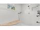 Large shower with multiple shower heads and tiled walls at 26 Cormorant Island Ln, Kiawah Island, SC 29455