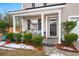 Inviting front porch with seating area and potted plants at 3043 Mapleleaf Dr., Moncks Corner, SC 29461