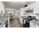 Bright kitchen boasts stainless steel appliances and an eat-in area at 3043 Mapleleaf Dr., Moncks Corner, SC 29461