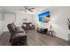 Living room with shiplap wall, hardwood floors, and comfy seating at 3043 Mapleleaf Dr., Moncks Corner, SC 29461