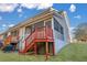 Home's back deck and stairs leading to a grassy yard at 329 Flyway Rd, Goose Creek, SC 29445