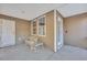 Covered patio with white metal furniture and access to the home at 329 Flyway Rd, Goose Creek, SC 29445