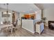 Kitchen with wood cabinets, black appliances, and a breakfast bar at 329 Flyway Rd, Goose Creek, SC 29445