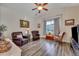 Spacious living room with hardwood floors and vaulted ceiling at 329 Flyway Rd, Goose Creek, SC 29445