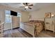 Spacious main bedroom with a floral comforter and ample closet space at 329 Flyway Rd, Goose Creek, SC 29445