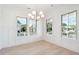 Bright dining room with chandelier and hardwood floors at 3315 Hopkinson Plantation Rd, Johns Island, SC 29455