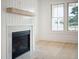 Modern fireplace with marble surround and wood mantel at 3315 Hopkinson Plantation Rd, Johns Island, SC 29455