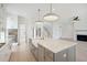 Open concept kitchen with large island and stainless steel appliances at 3315 Hopkinson Plantation Rd, Johns Island, SC 29455