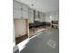 Kitchen under construction with dark wood cabinets and island at 3315 Hopkinson Plantation Rd, Johns Island, SC 29455