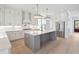 Open concept kitchen with a large island and stainless steel appliances at 3315 Hopkinson Plantation Rd, Johns Island, SC 29455