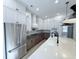 Modern kitchen with white cabinets and stainless steel appliances at 3315 Hopkinson Plantation Rd, Johns Island, SC 29455