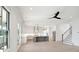 Bright kitchen features an island, white cabinets, and hardwood floors at 3315 Hopkinson Plantation Rd, Johns Island, SC 29455