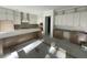 Kitchen under construction with island and wood cabinets at 3315 Hopkinson Plantation Rd, Johns Island, SC 29455