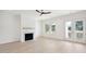 Light-filled living room with fireplace and French doors at 3315 Hopkinson Plantation Rd, Johns Island, SC 29455
