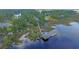 Aerial view of waterfront home and private dock at 4007 Capensis Ln, Ravenel, SC 29470