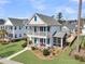 Two-story home with porch and screened porch at 4007 Capensis Ln, Hollywood, SC 29470