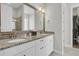 Bathroom with double vanity, granite countertop, and access to a walk-in closet at 4007 Capensis Ln, Hollywood, SC 29470