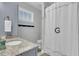 Bathroom with shower, toilet and granite countertop at 4007 Capensis Ln, Ravenel, SC 29470
