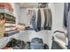 Organized closet with shelving and hanging rods, ideal for storing luggage and clothing at 4007 Capensis Ln, Ravenel, SC 29470