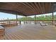 Spacious covered deck offering ample seating and river views at 4007 Capensis Ln, Ravenel, SC 29470