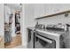 Laundry room with washer, dryer, and additional storage cabinets at 4007 Capensis Ln, Ravenel, SC 29470