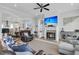 Spacious living room with fireplace, hardwood floors, and ample natural light at 4007 Capensis Ln, Ravenel, SC 29470