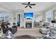 Relaxing living room with fireplace, large TV, and comfortable seating at 4007 Capensis Ln, Ravenel, SC 29470