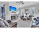 Bright living room featuring a fireplace and comfortable seating area at 4007 Capensis Ln, Ravenel, SC 29470