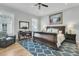 Spacious main bedroom with hardwood floors, a ceiling fan, and large windows at 4007 Capensis Ln, Ravenel, SC 29470
